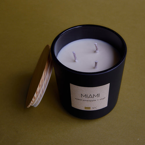 soy candle in large matte black jar